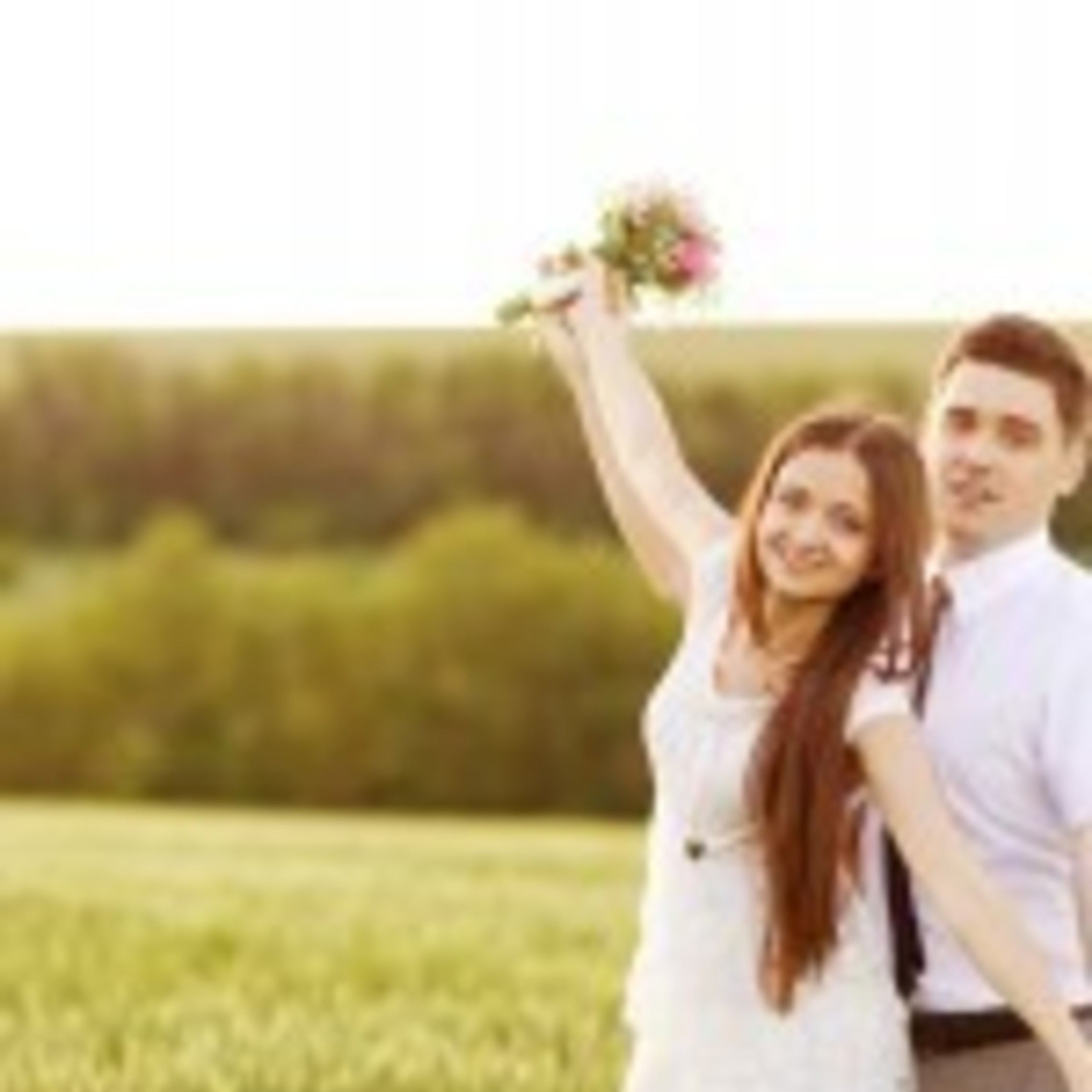 Young woman and her boyfriend pose happily